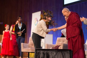 Young panelists arriving on stage to take part in a conversation with His Holiness the Dalai Lama as part of the SPARK 2014 program organized by the Dalai Lama Center for Ethics and Transformative Values at MIT's Kresge Auditorium in Cambridge, MA, USA on October 31, 2014. Photo/Fredo Durand